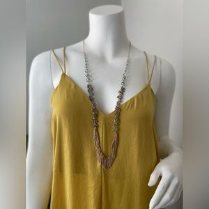 Stylish long gold tone necklace